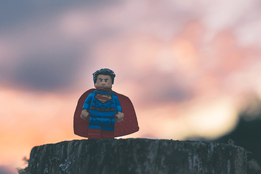 superman lego hero character Two mountain bikers descending a rocky step on the Rostrevor Red trail in Kilbroney Forest Park near the Mourne Mountains