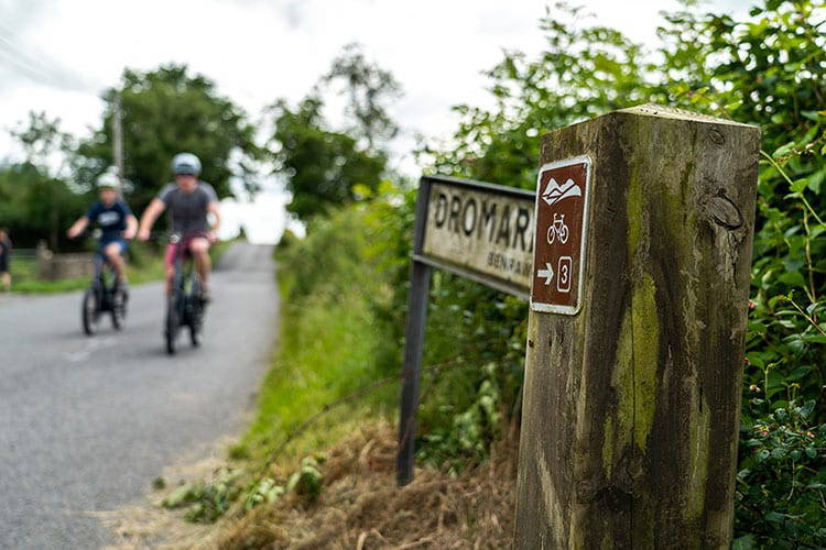 cycling on ebikes along route 3 in the Mourne Mountains